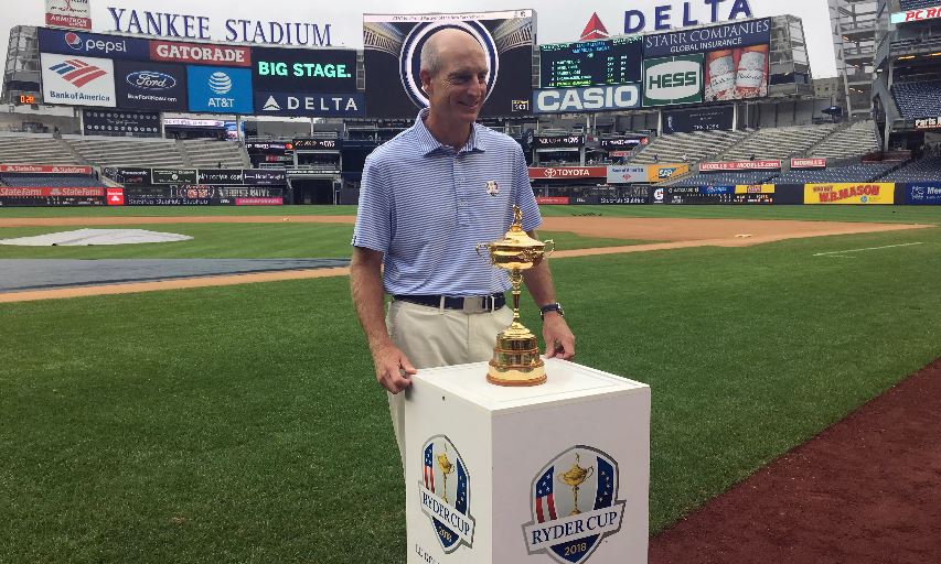 Jim Furyk at Yankee Stadium with the Ryder Cup trophy